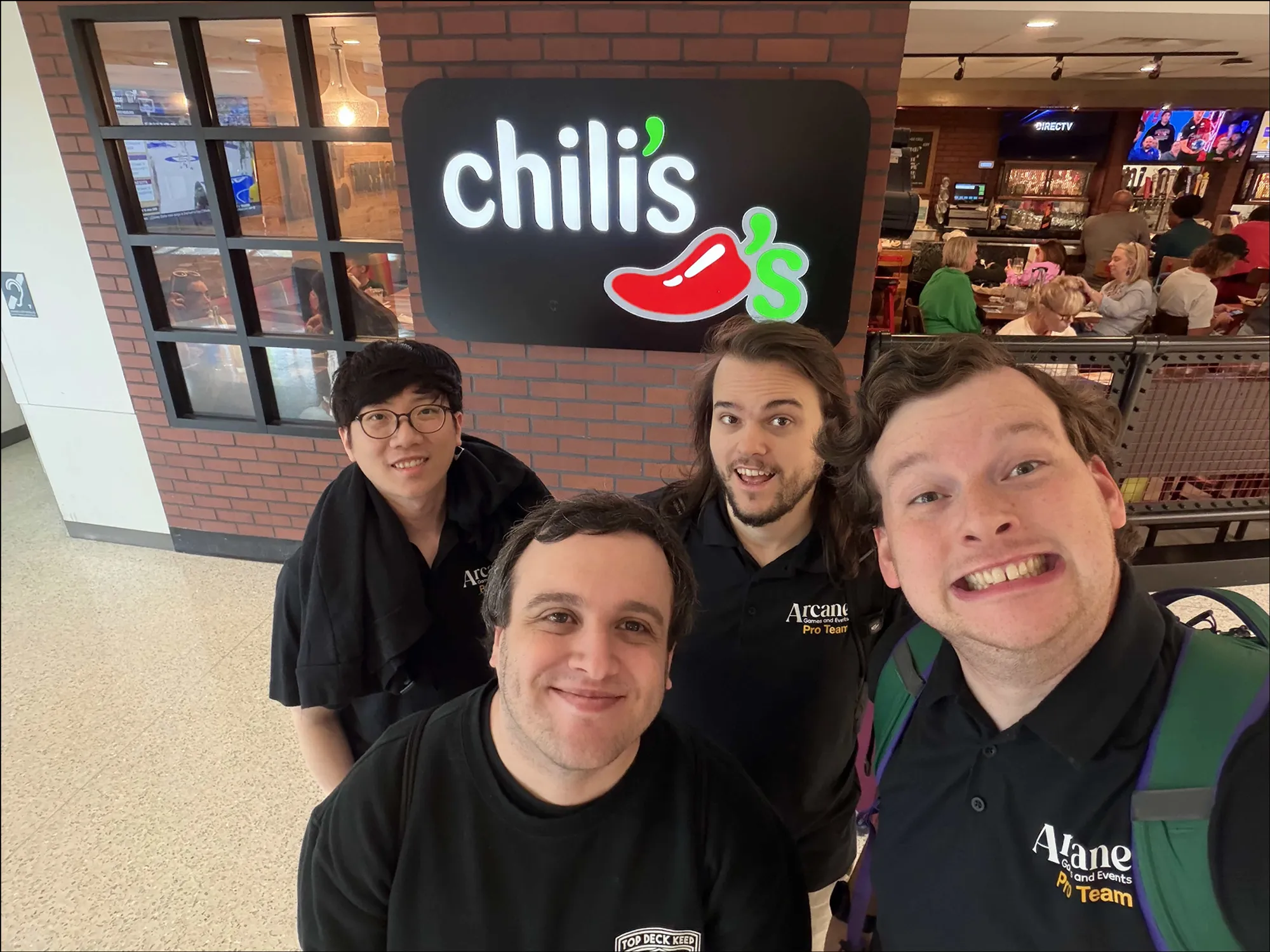 AGE Pro Team in front of a Chili's at MEM airport