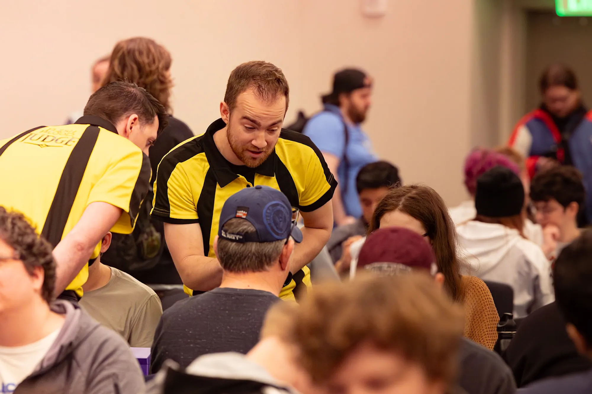 Two FaB judges taking a judge call.