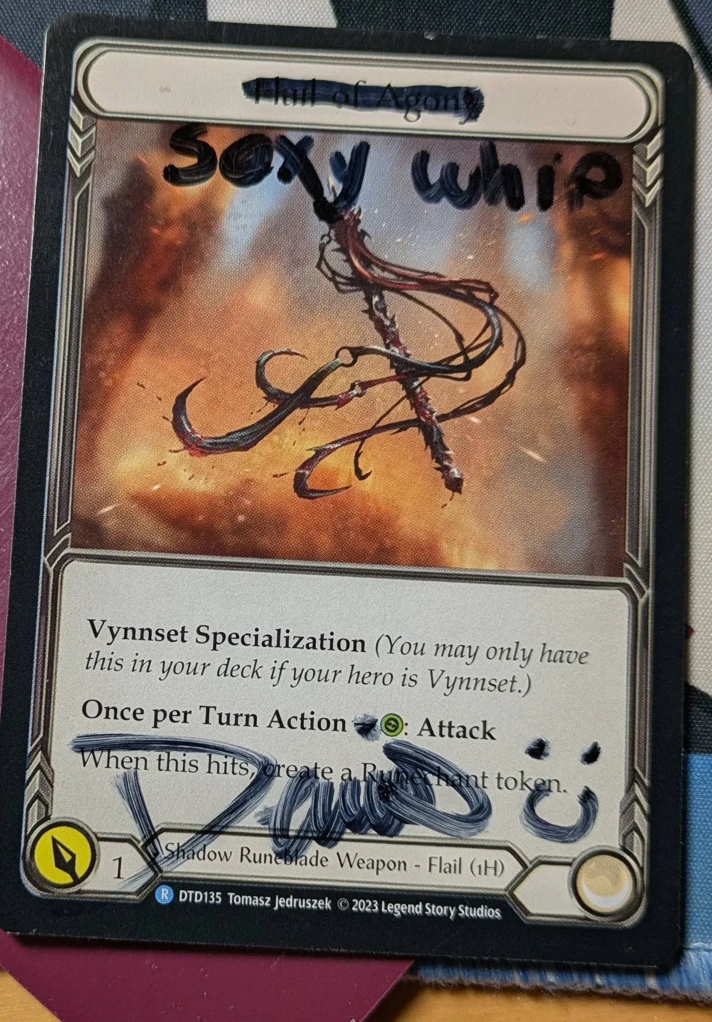 Dennis signed Flail of Agony with the name changed to "sexy whip"